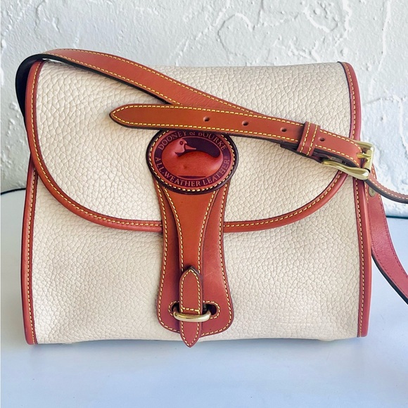 VINTAGE DOONEY AND BOURKE  BEIGE/CREAM ESSEX AWL SHOULDER CROSSBODY BAG TAN TRIM